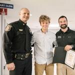 Graduate receives award for saving life of high school hockey player